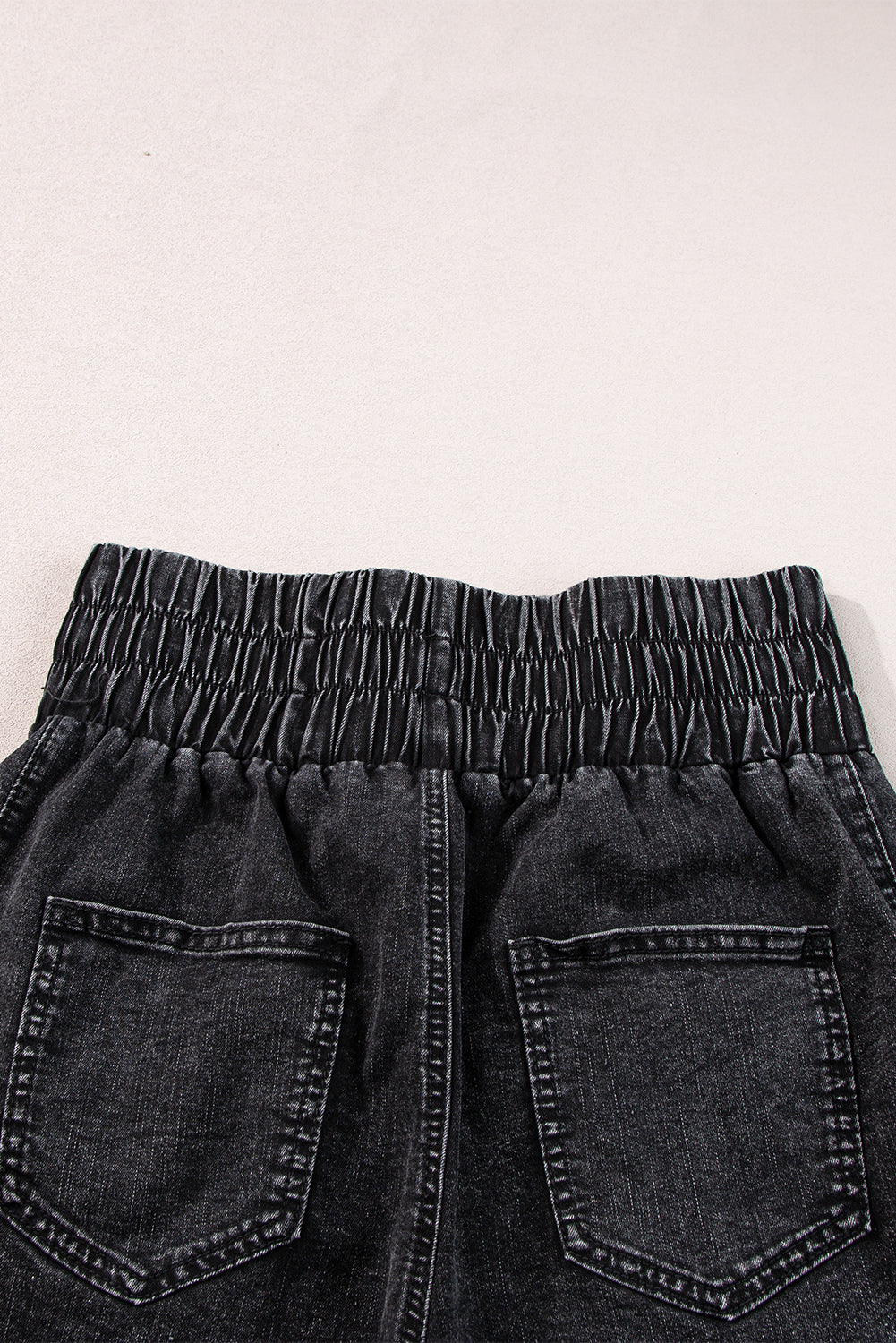 Black Smocked High Waist Mineral Washed Jean Shorts